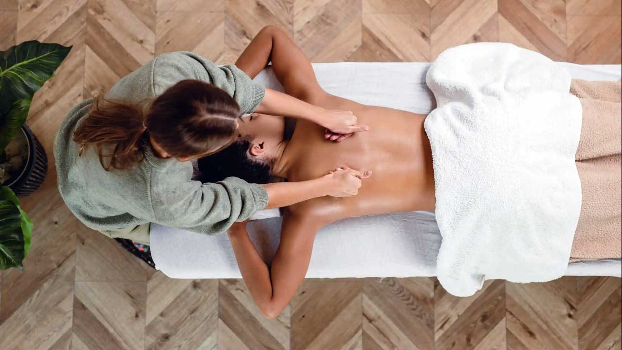 Woman gets a deep healing massage