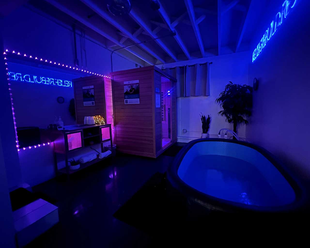 Recovery room of Next Level Holistic Healing in Santa Monica with sauna and cold plunge bath.